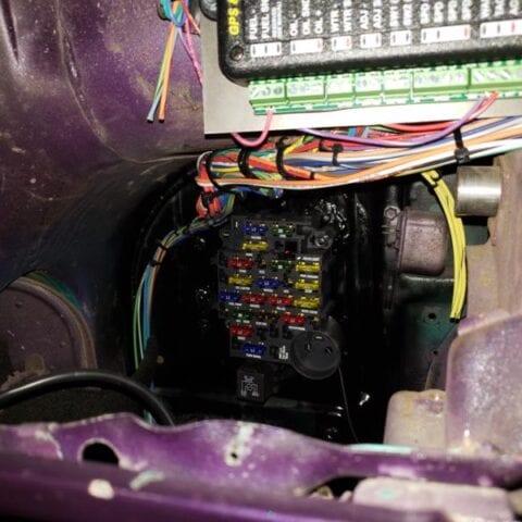Car fuse box with colorful wiring