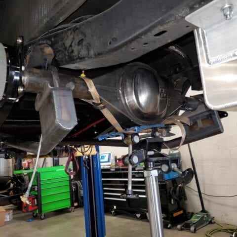 Truck undercarriage with axle and air tank