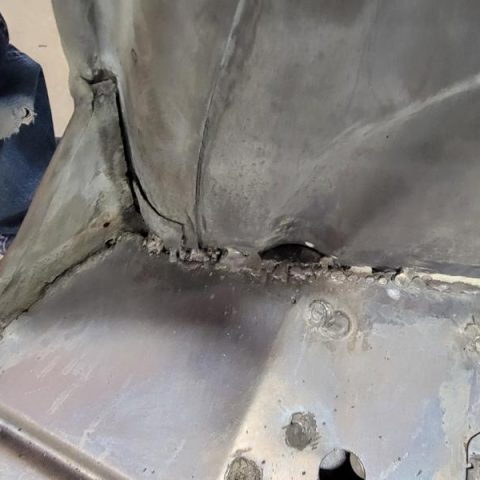 Welded metal repair on vehicle panel