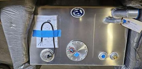 Control panel with gauges and a gauge calibration certificate.