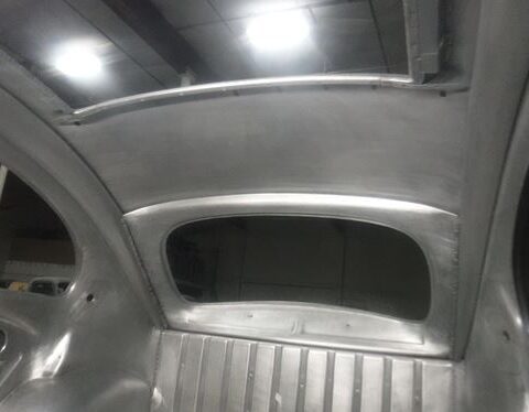 Stripped metal car interior shell