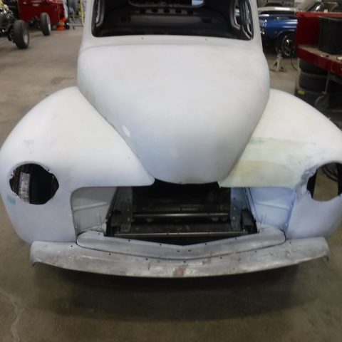 Vintage car front missing headlights restoration